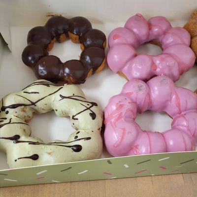 Mochi Donuts:  Pretty in Pink (Strawberry), on the right; Chocolate (Top left) and Matcha (White Chocolate), bottom left.