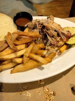 Pulled pork sandwich with fries