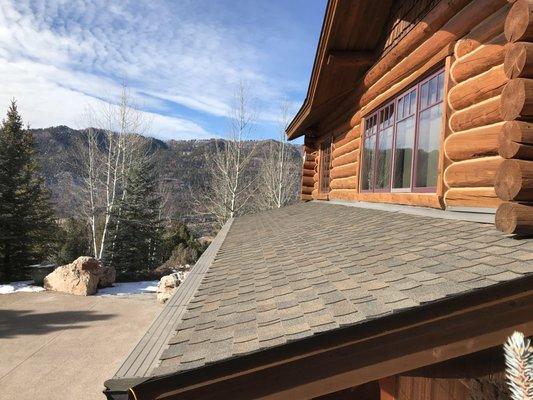 Gutter Helmet on a Presidential Roof style shingle... such a clean transition.