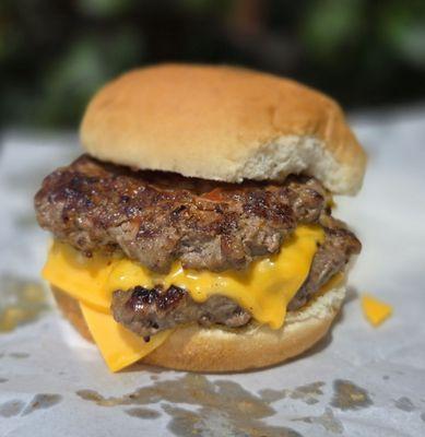 Juicy and flavorful double cheeseburger, loaded with meat. Priced at $6.81 as of September 2024.