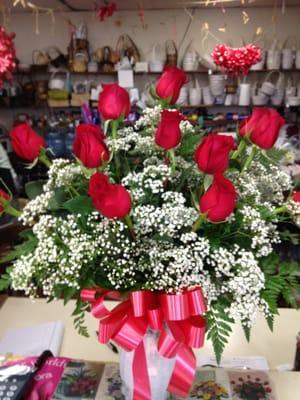 1 dozen red roses... $49.00 .... Great service & nice roses.