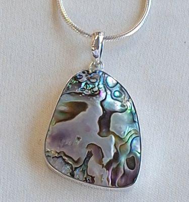 Beautiful abalone pendant set in sterling silver on a sterling snake chain