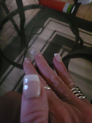 Bumpy nails  asked for a French dip dipping powder manicure. Got them done 1 week ago now one nail fell off. $50rip off