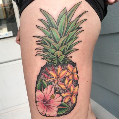 Floral pineapple Tattoo done by Tommy Tingle at Mid-Pacific Tattoo In Bonita Springs Florida