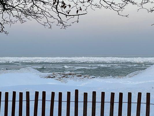 Winter time @ Lee Street beach taken February 2021. See the pockets of ice sheets over Lake Michigan?