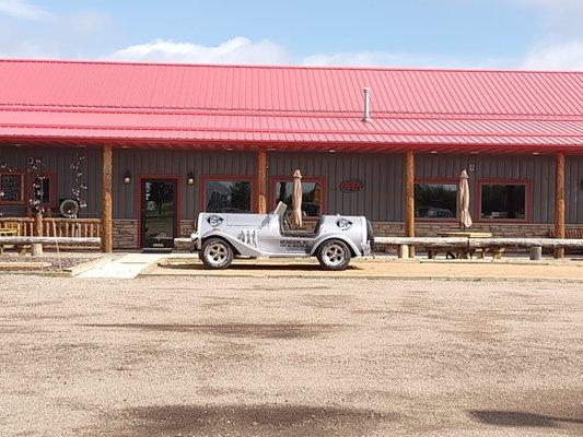 old car out front of the brewery