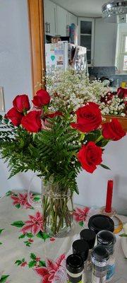 A dozen red roses with four pink roses, to celebrate my mom on my special birthday!