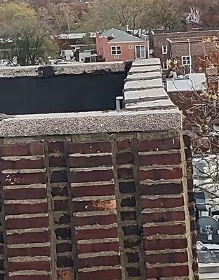 Leaning parapet wall.  Missing/Broken Mortar. 84-53 Dana Court, Middle Village Queens.