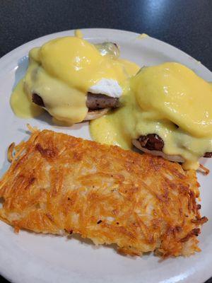 Eggs benedict with very crispy hashbrowns.