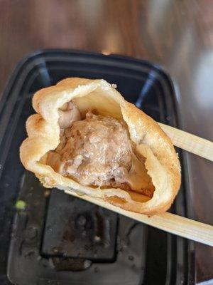 Inside of sheng jian bao-- lots of the soup already leaked out