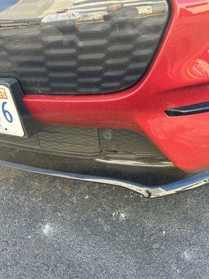 Body damage to front bumper at pick up. "Sorry our printer is broken. Can't print a contract to note the damage at pick up"