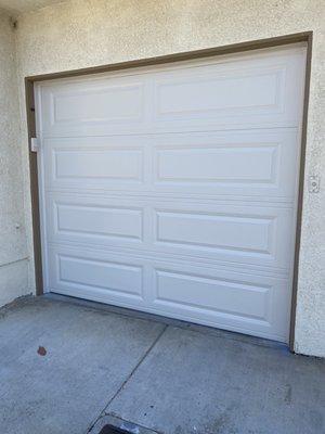 New single insulated garage door installed by Julio