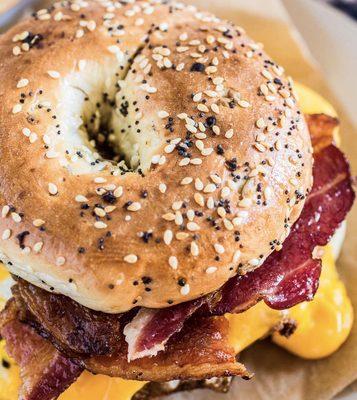 Enjoy a buttery topped bagel breakfast sandwich