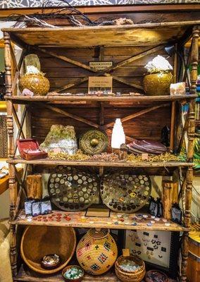 Shelves with blessing stones, large raw mineral displays