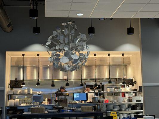 Awesome chandelier and open kitchen