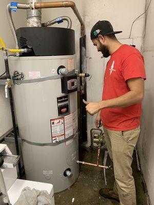 Alex checking that this commercial water heater is working properly. Great work, Alex.