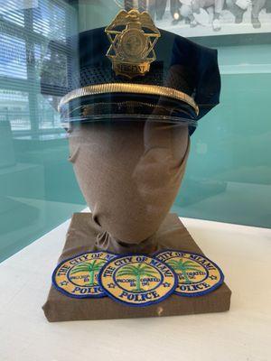 Police officer hat and badges.