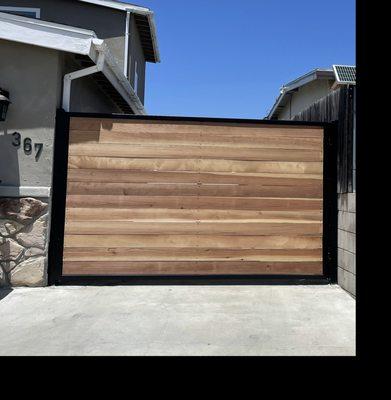 New redwood Gate metal frame with Lift Master opener.
Chula Vista 91914