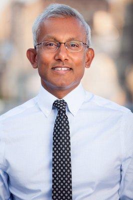 Outdoor corporate business headshot.  Casual without jacket.  Hancock Headshots, New York, NY.