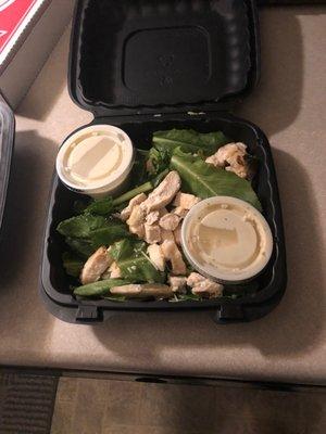 "Large chicken caesar salad, 6 pieces of lettuce"