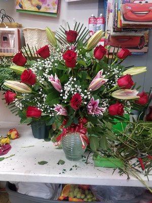 Go big or go home, with this rose and lily arrangement your loved one is sure to fall head over heels for you!