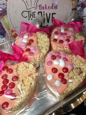 Large Rice Krispie Hearts dipped in white chocolate and adorned with M & M's.