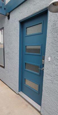 Masonite Fiberglass door installation including stucco to match existing.  Mission Bay life is a happy life.