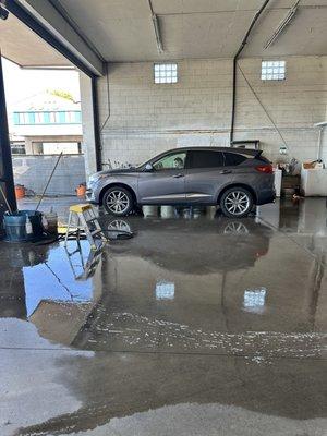 U turn in a service bay for the indoor wash.