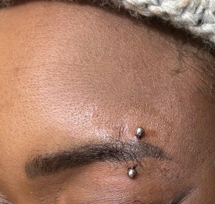 Eyebrow piercing