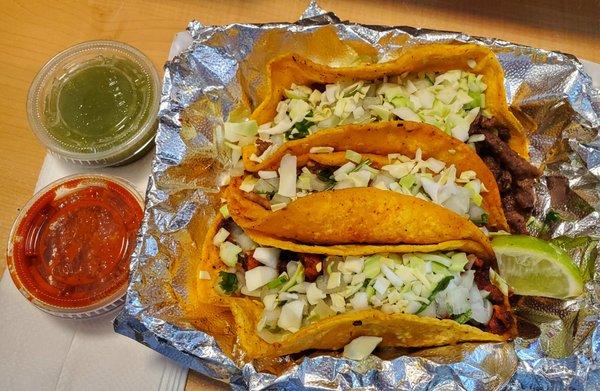 Asada, carnitas, and al pastor tacos