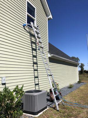 Exterior window tinting to reduce melted siding and burnt turf