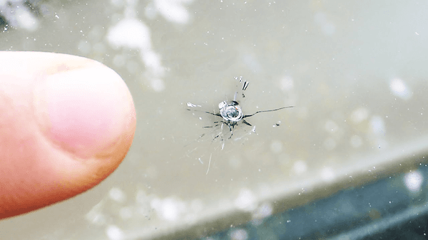 Have a crack in your windshield like this? Stop it before it spreads for only $50!**  **$50 for up to 3 chips on the same windshield.