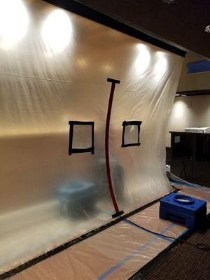 Mold Mitigation, building of containment And applying  negative air.