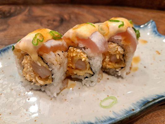 White Dragon roll - spicy crab and deep fried shrimp topped with escolar and albacore