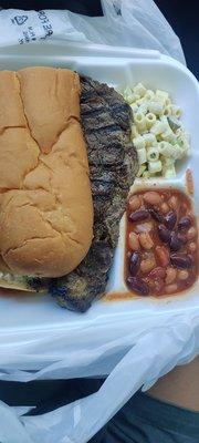 Ribeye steak sandwich and macaroni salad