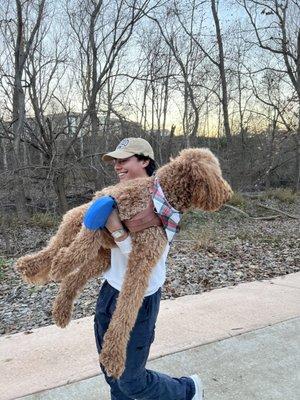 My brother carrying my son after a long walk