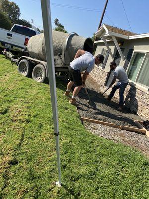 Boys pourin some mud