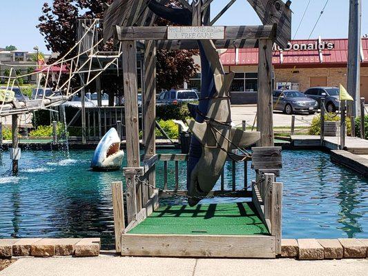 As you enter the course you find a great white as the finishing hole.