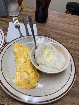 2 eggs with hoop cheese and a bowl of buttery grits.