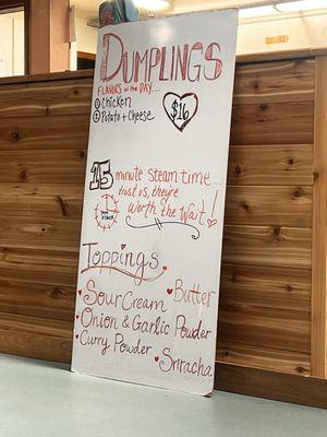 Dumplings sign with flavors ( Juneau Location)