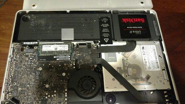 SSD hard drive in place inside of MacBook Pro.