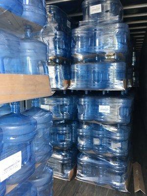 unloading bottles | office water delivery