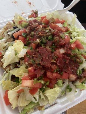 Tofu nachos, no cheese, no queso, add lettuce, jalapeños, salsa, tomatoes - doesn't look like much, but so tasty!