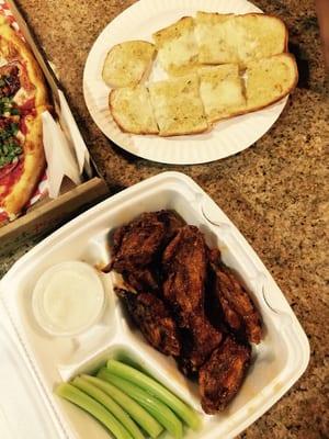 Wings and cheese garlic bread.