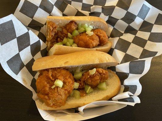 Buffalo Chicken Sandwich - boneless chicken, blue cheese and pieces of celery on top. Plain hoagie roll, a decent sandwich