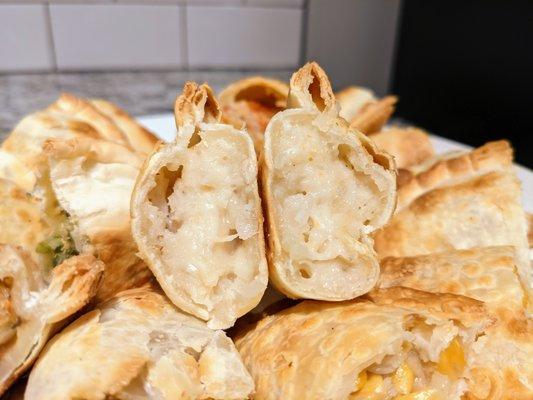 Onion & Cheese empanada. $2.75.