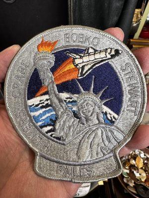 Space Shuttle patches.