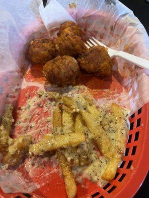 Spicy garlic boneless wings and parmesan garlic fries