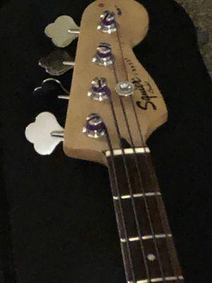 Squier Jazz bass restrung with LaBella nylon tapewounds.