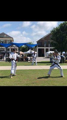 A demostration by TKDo's demo team featuring Tin Phan, Xander Kehoe, and Trey Kilgore at Cambridge Square in Ooltewah, TN.